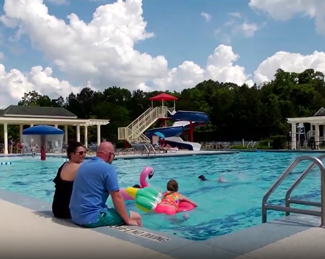 Family Chilling by the pool at TOB