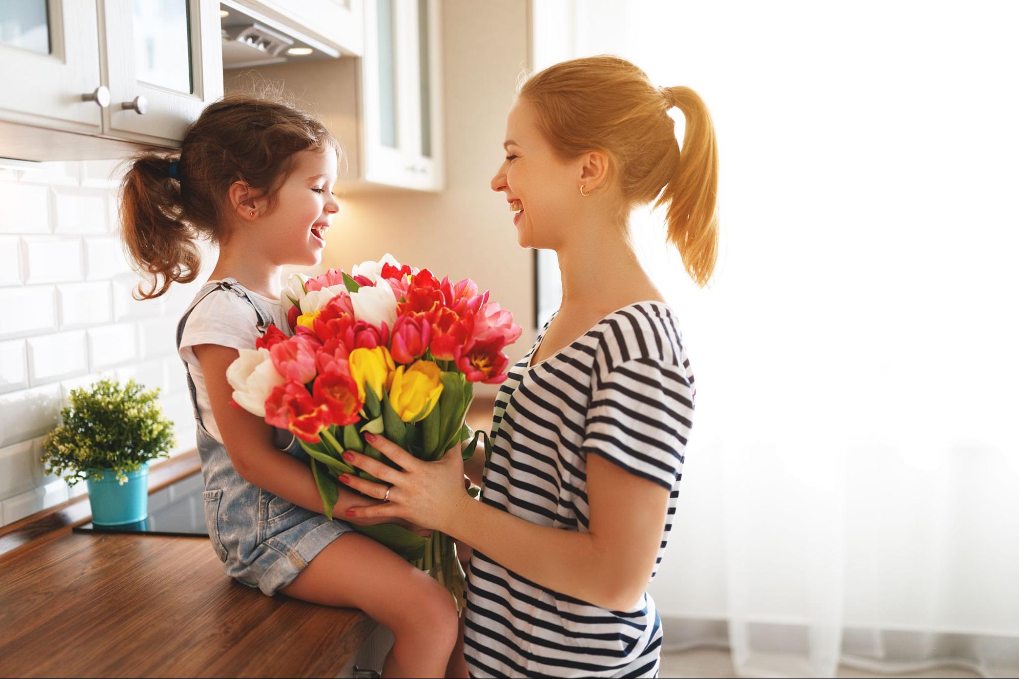 mother and daughter with flowers ©Evgeny Atamanenko